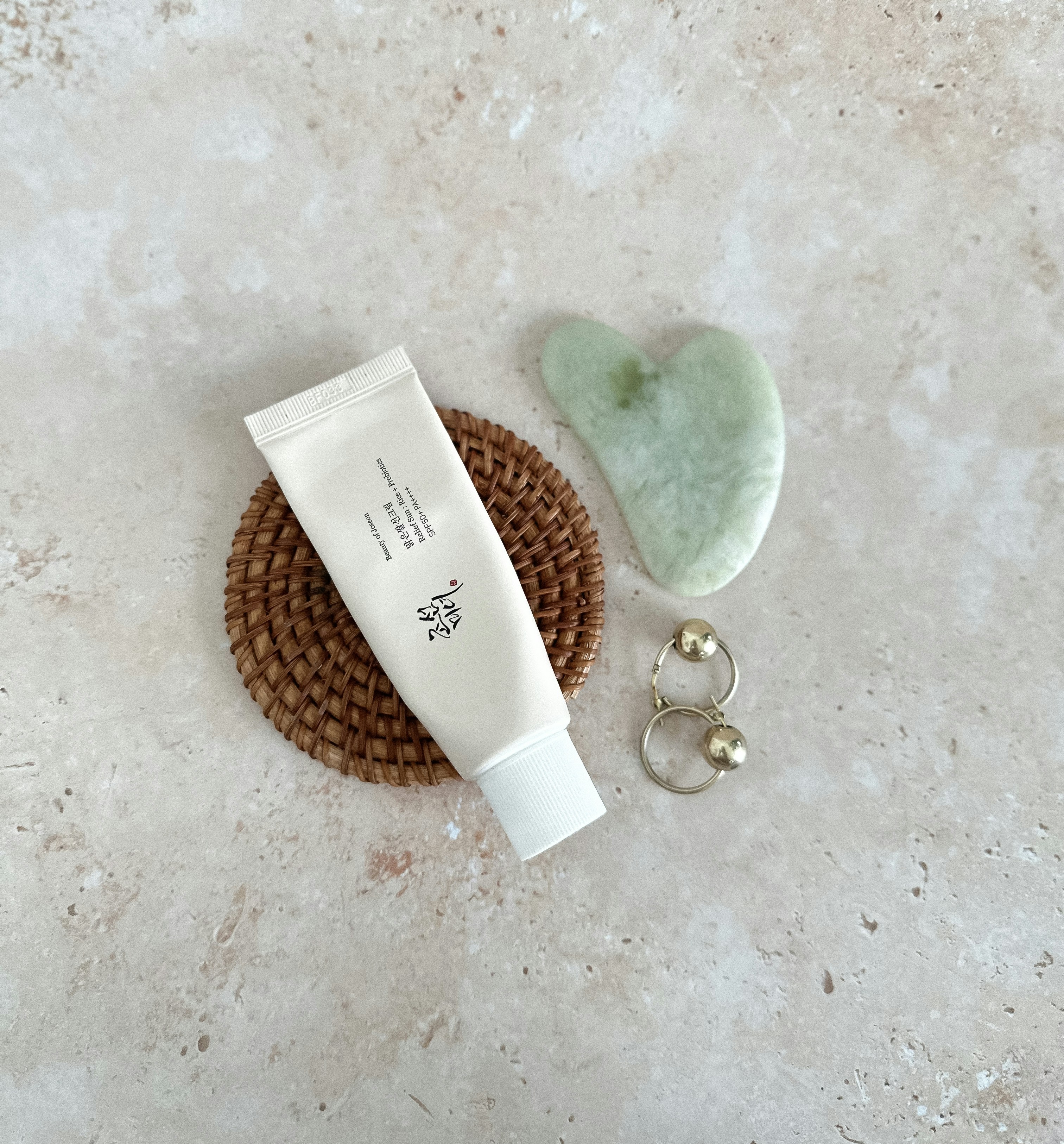 woman wearing yellow long-sleeved dress under white clouds and blue sky during daytime