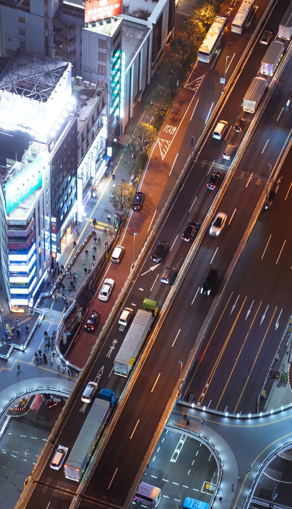 an aerial view of a busy city street at night
