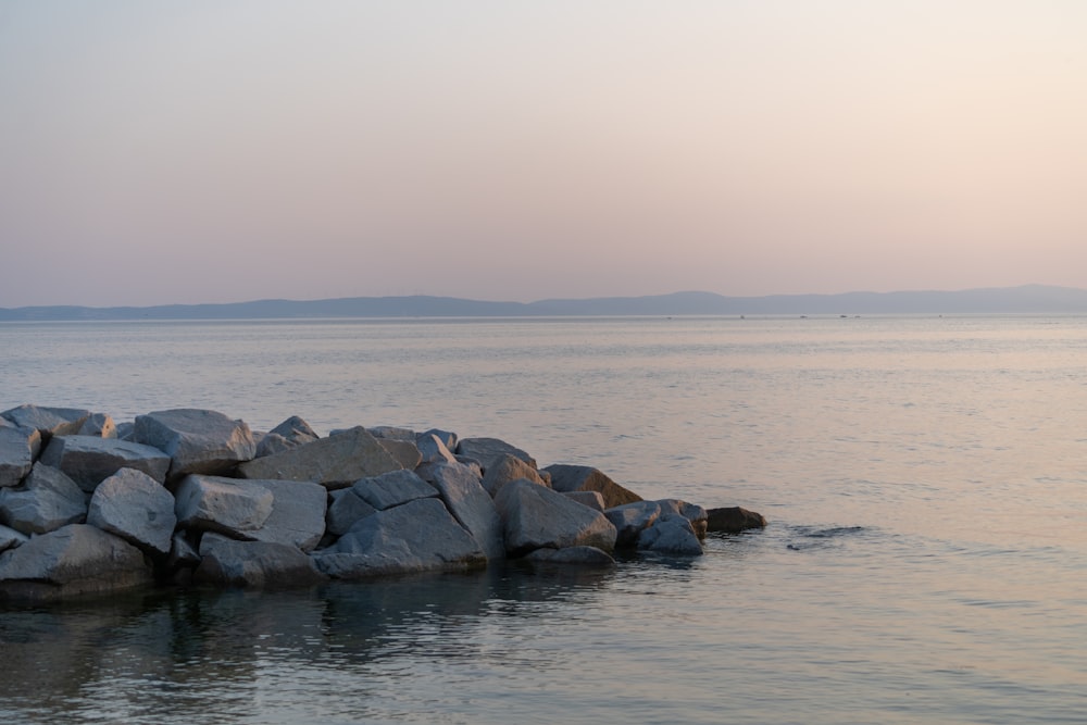 a large body of water surrounded by rocks