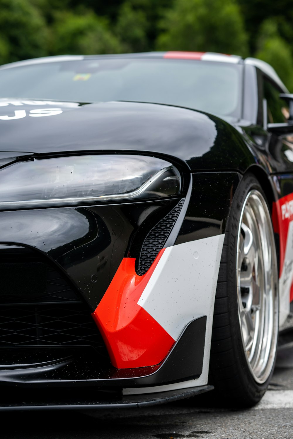 a close up of the front of a sports car