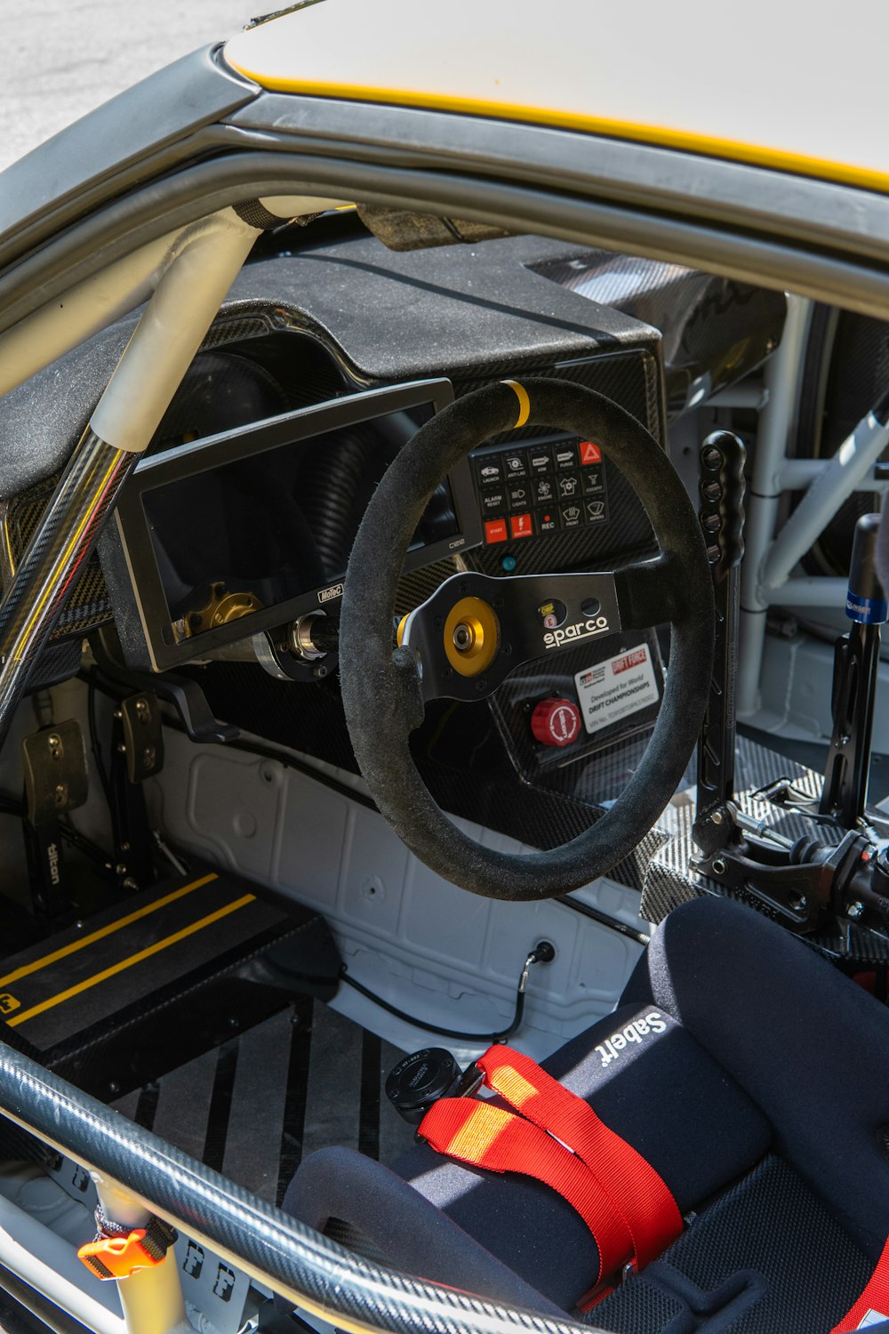 the interior of a car with a steering wheel