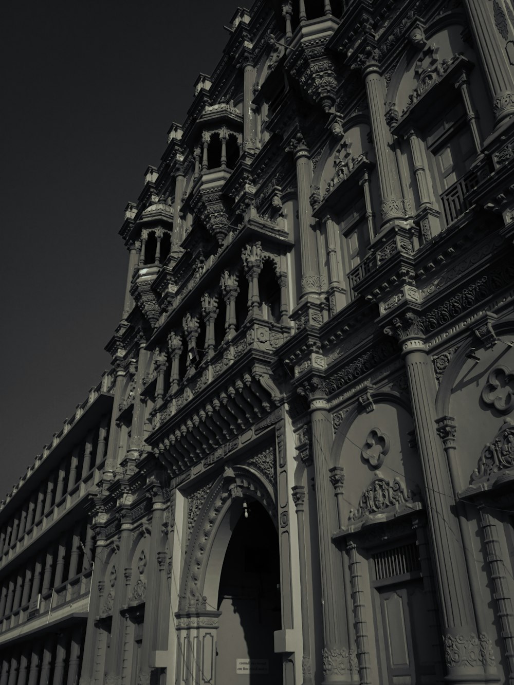 a black and white photo of an old building