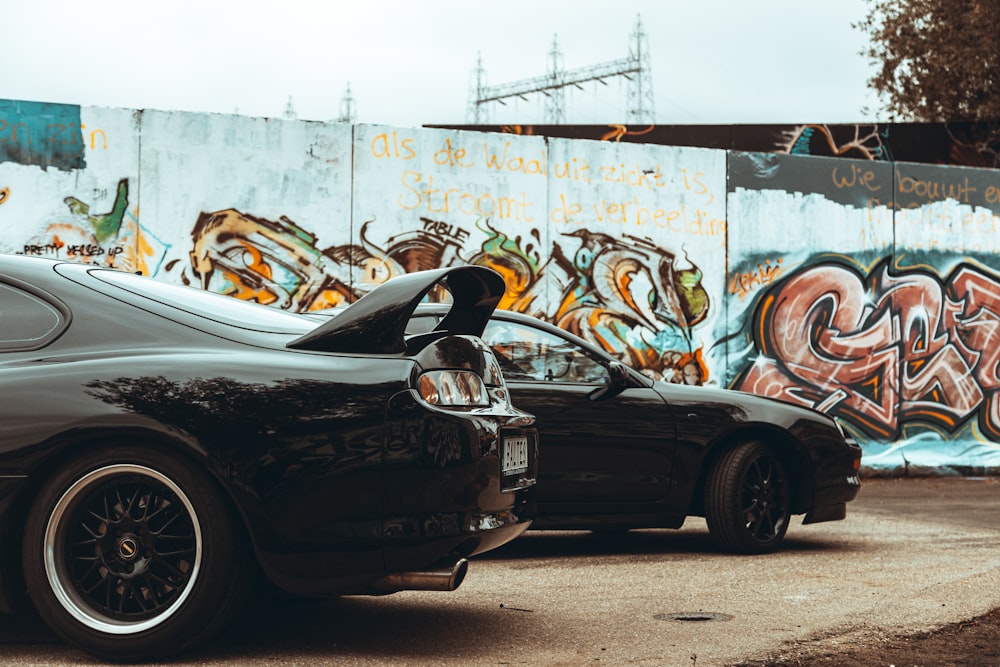 a couple of cars parked next to each other