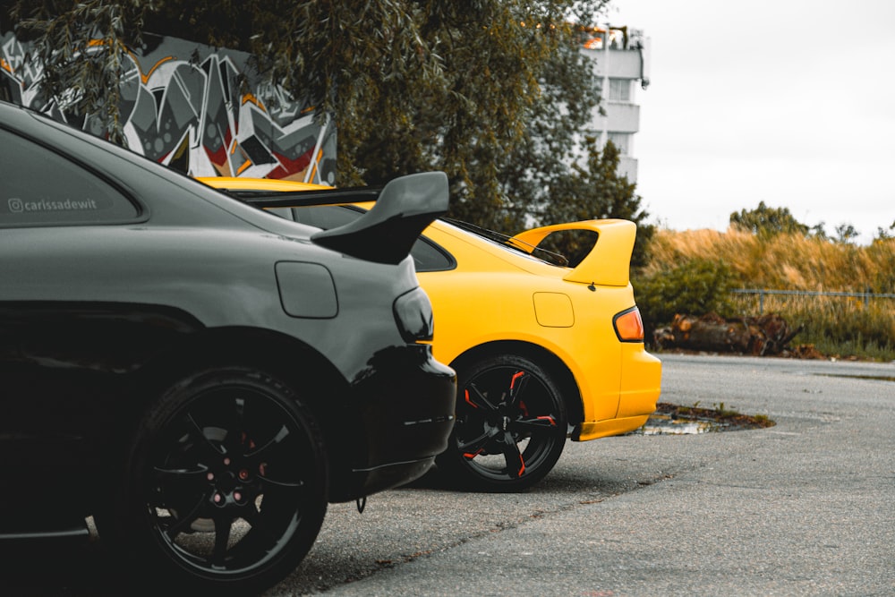 a couple of cars parked next to each other