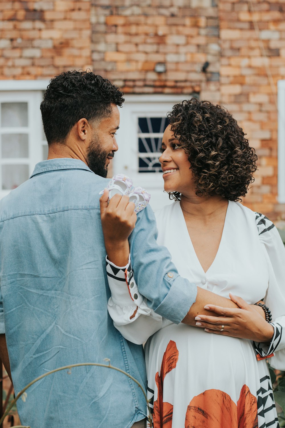 a man and a woman standing next to each other