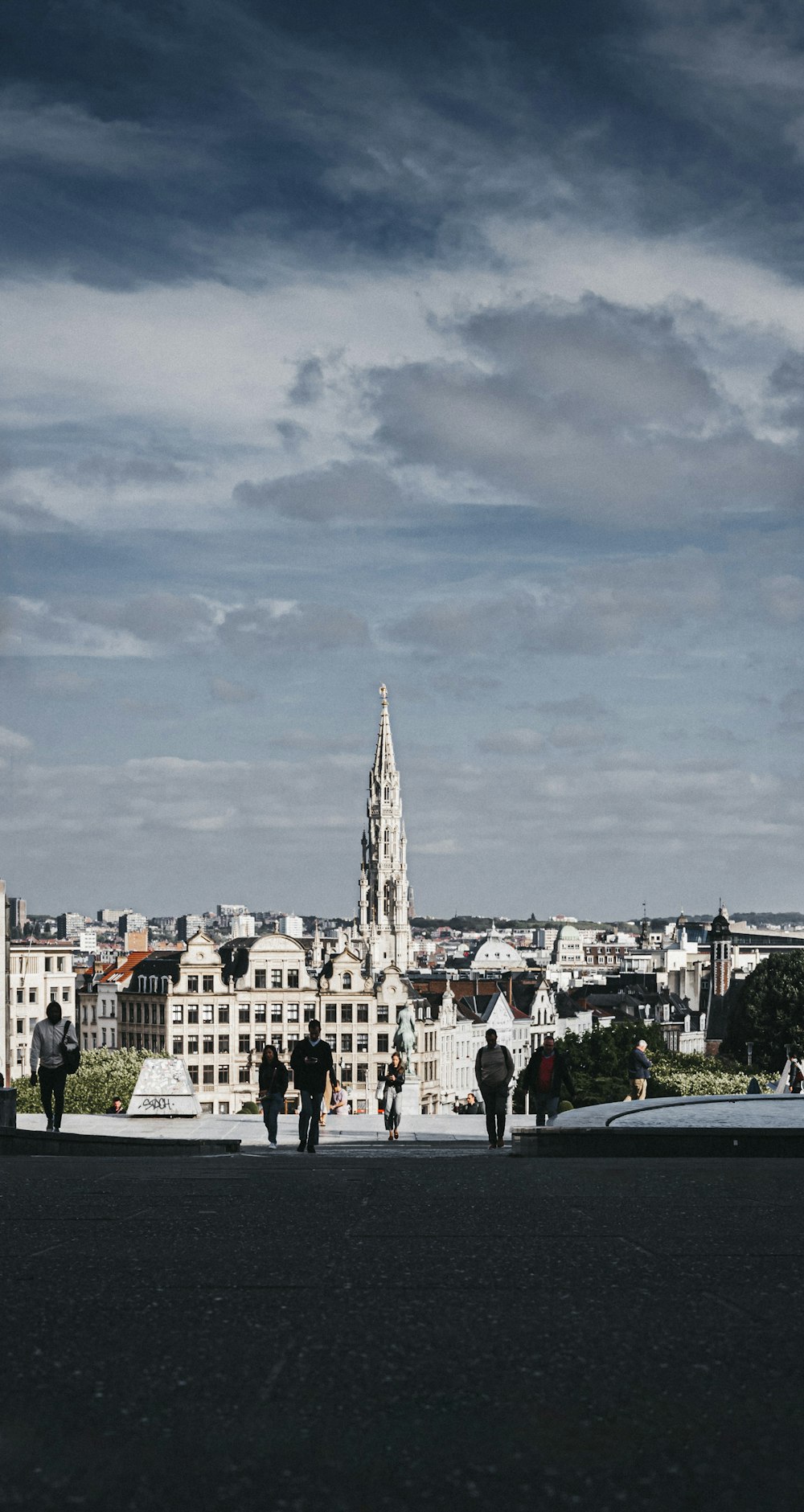 a group of people standing on top of a roof