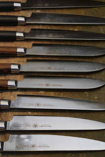 Professional cutlery on a kitchen counter