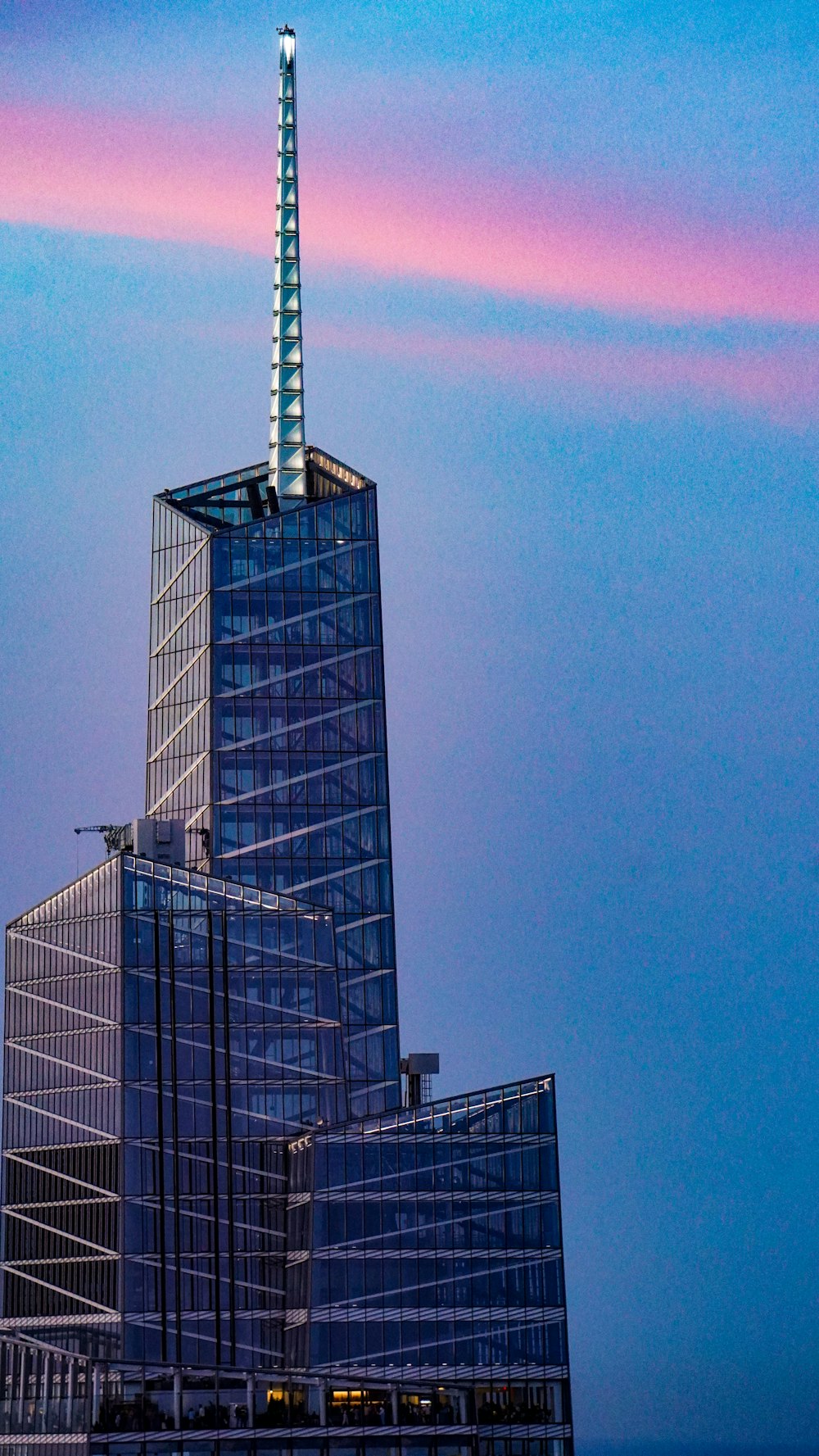 a very tall building with a very tall spire