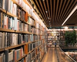 a library filled with lots of books on shelves