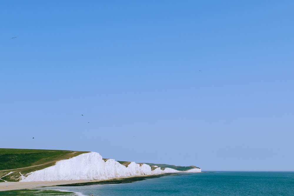 a view of the white cliffs of the beach