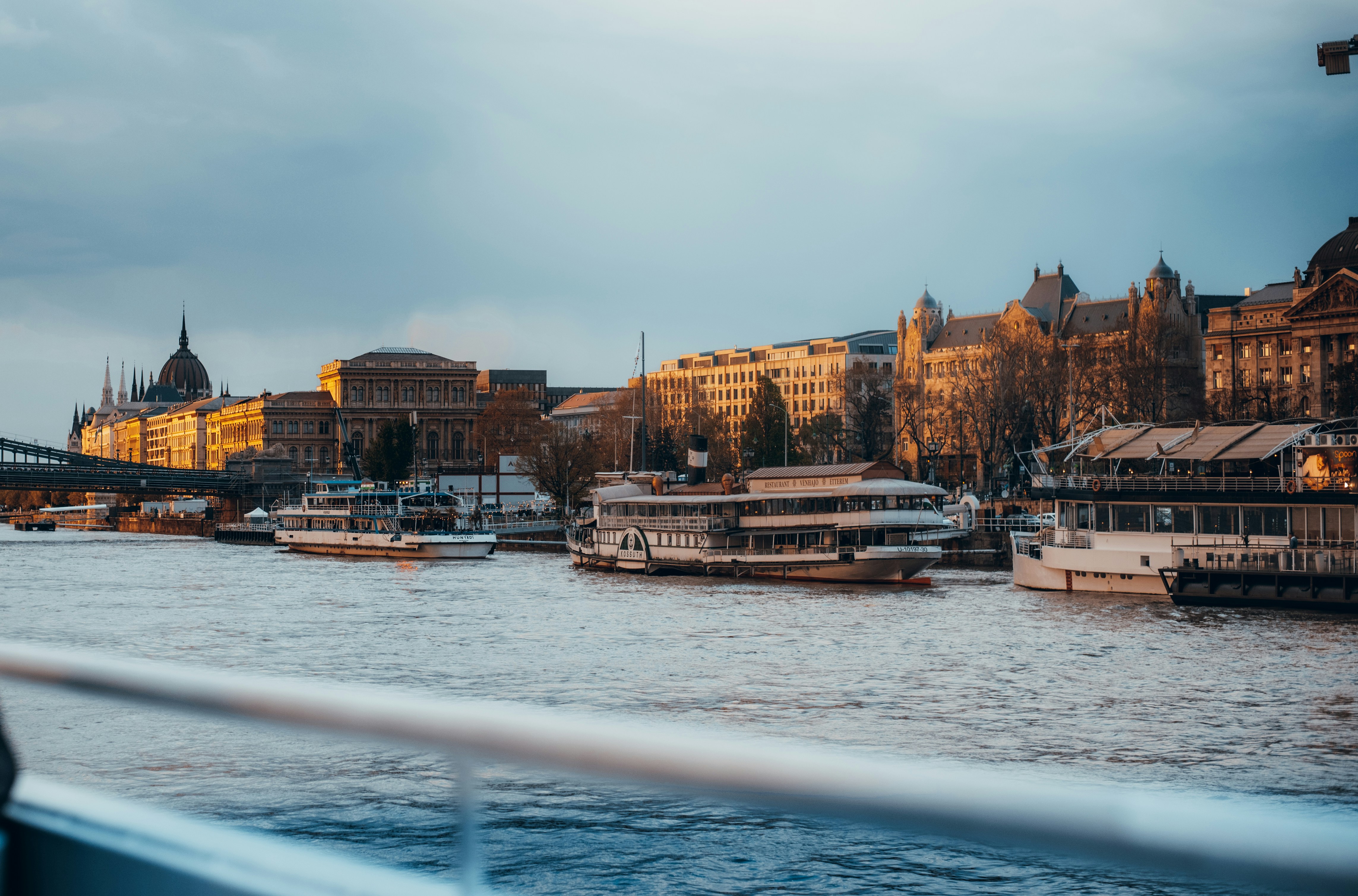 a river filled with lots of boats on top of it