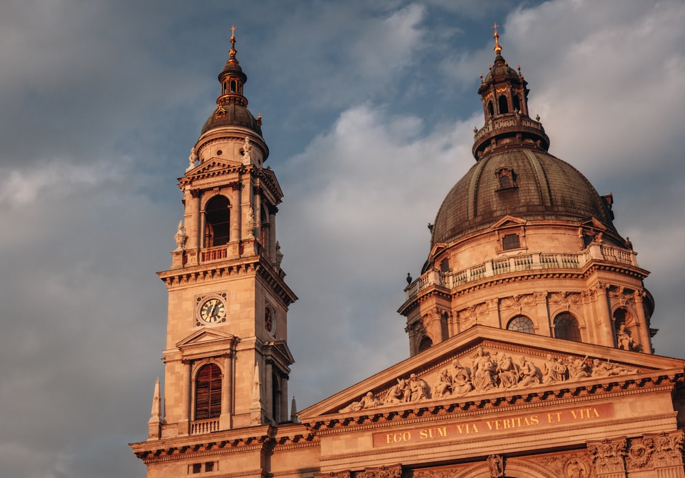 a large building with two towers and a clock