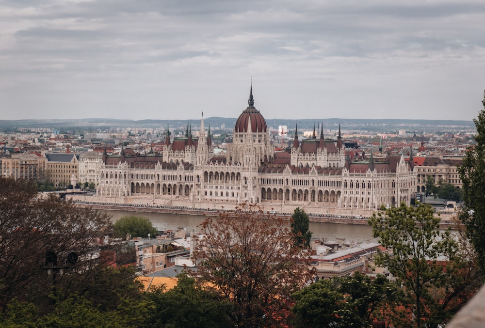 a view of a city with a large building in the background