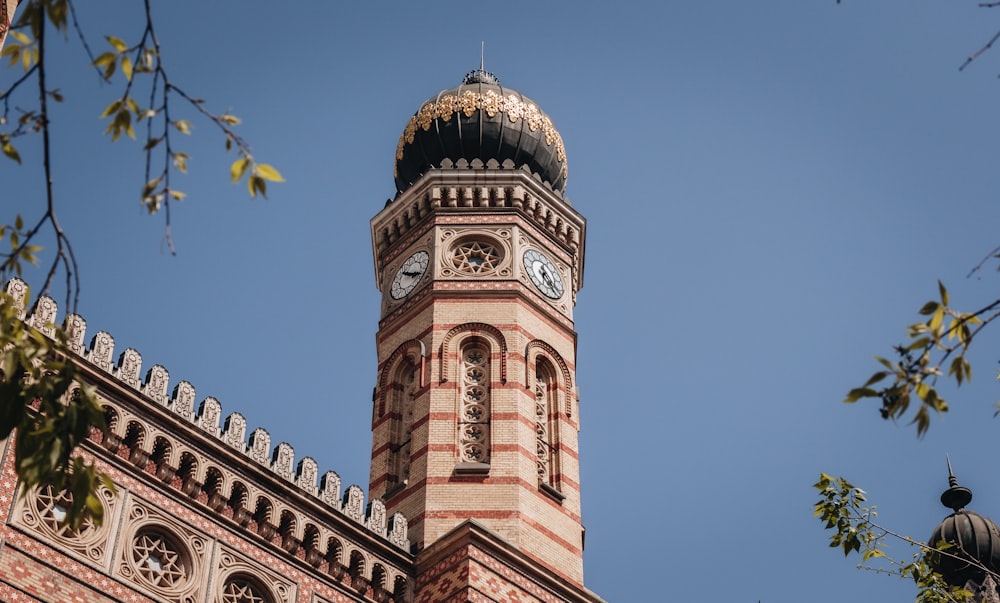 a tall tower with a clock on top of it