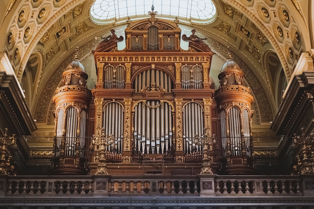 a large pipe organ in a church with a skylight