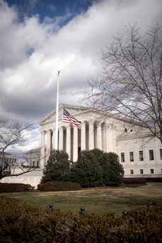 a large building with a flag on top of it