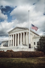 a large building with a flag on top of it