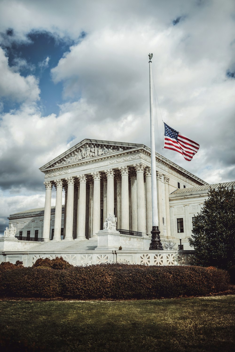 a large building with a flag on top of it