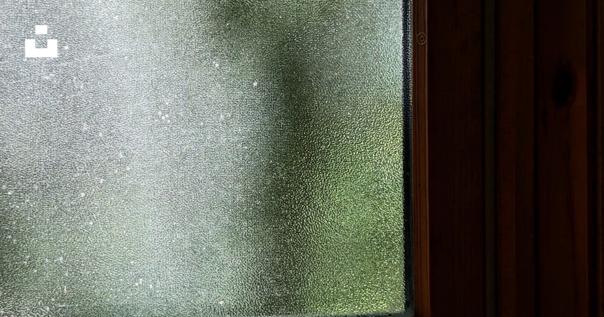 A pair of scissors sitting on a window sill photo – Free Dark Image on ...