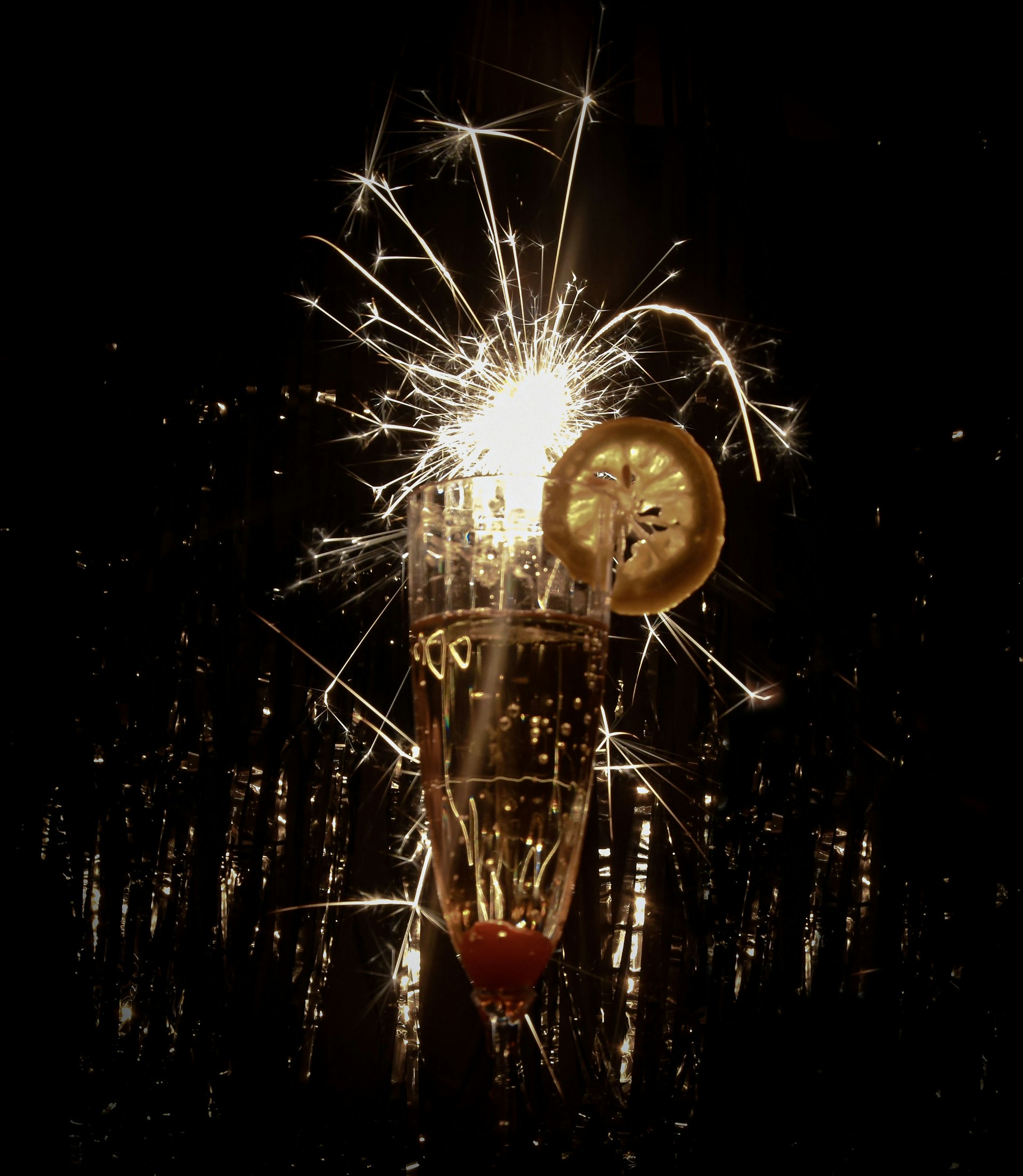woman wearing yellow long-sleeved dress under white clouds and blue sky during daytime