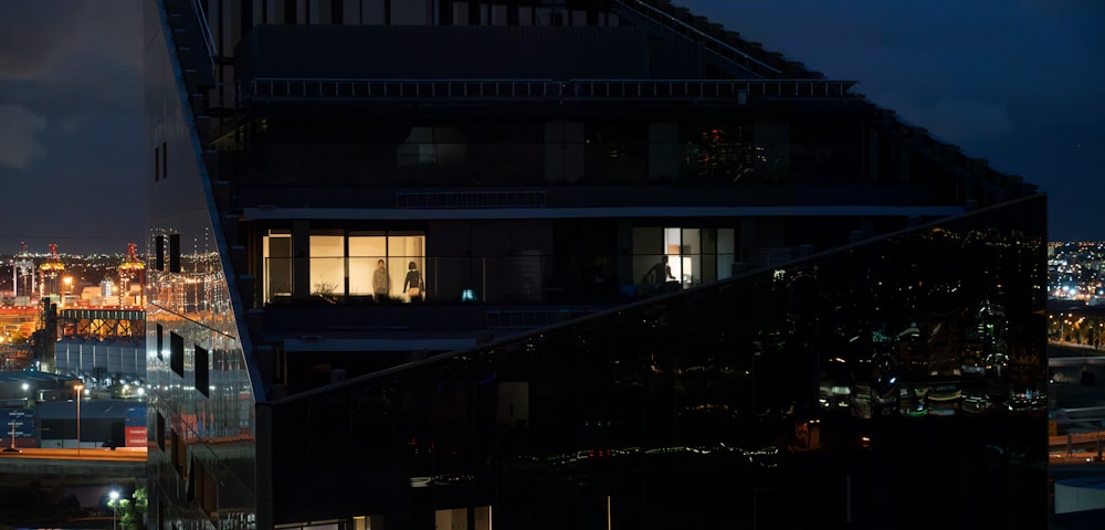 a view of a city at night from a high rise building