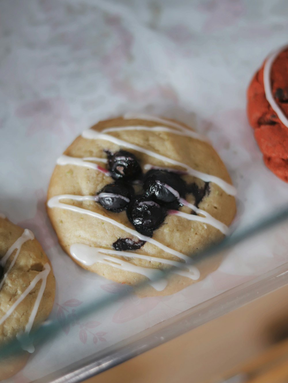 a couple of doughnuts sitting on top of a table