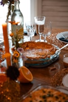 A cozy home dining table set with a variety of delicious homemade dishes.