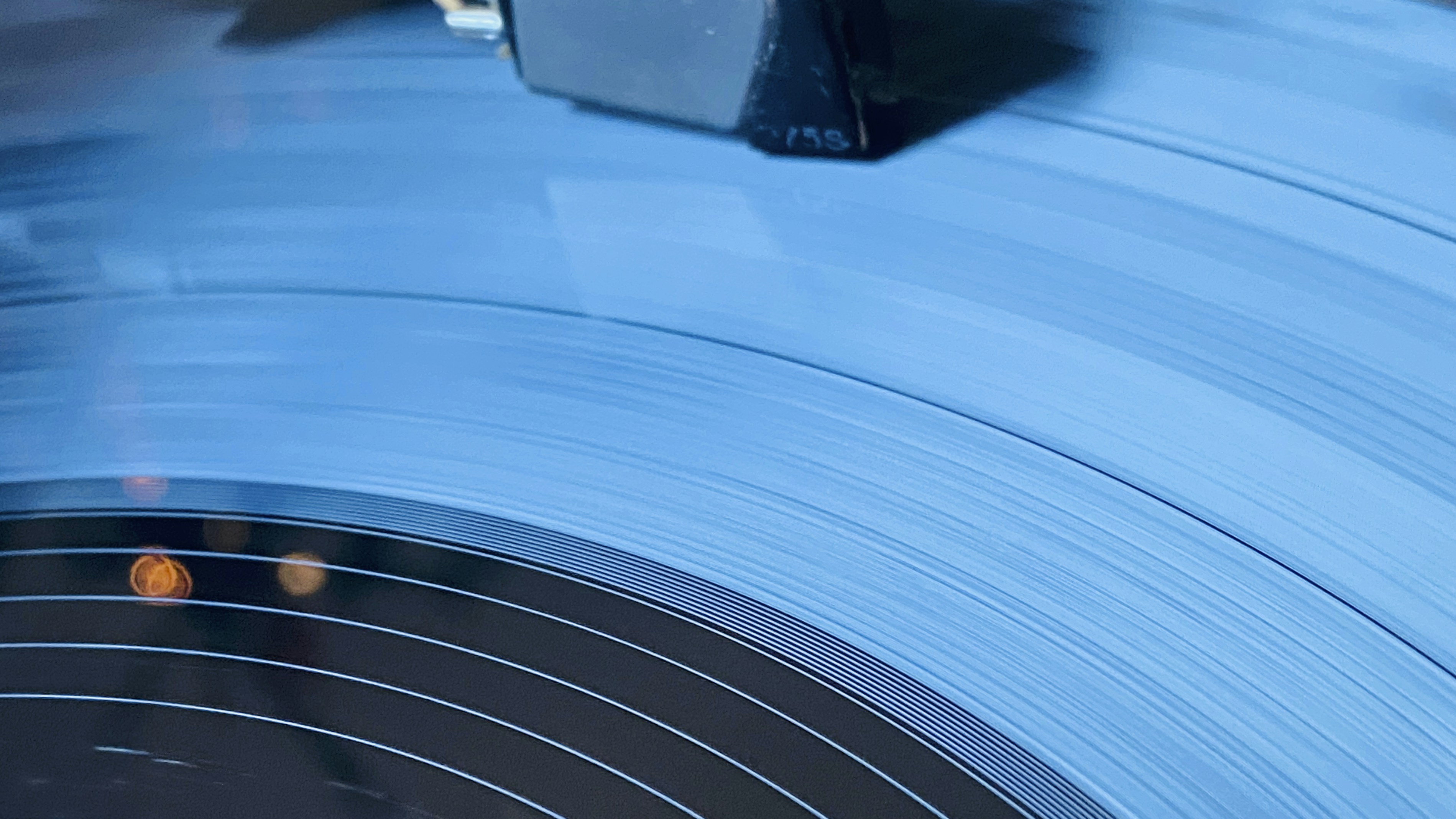 a record player playing a record on a turntable