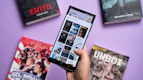 A sleek smartphone showing an eBook reading app with a cozy background.