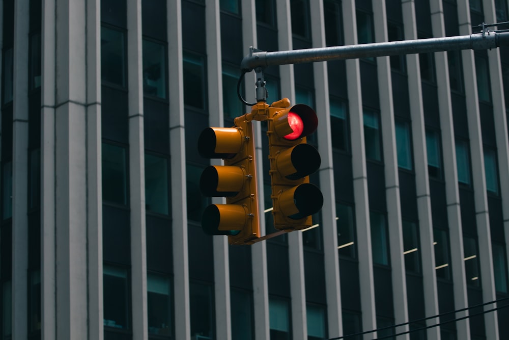 a traffic light hanging from a metal pole