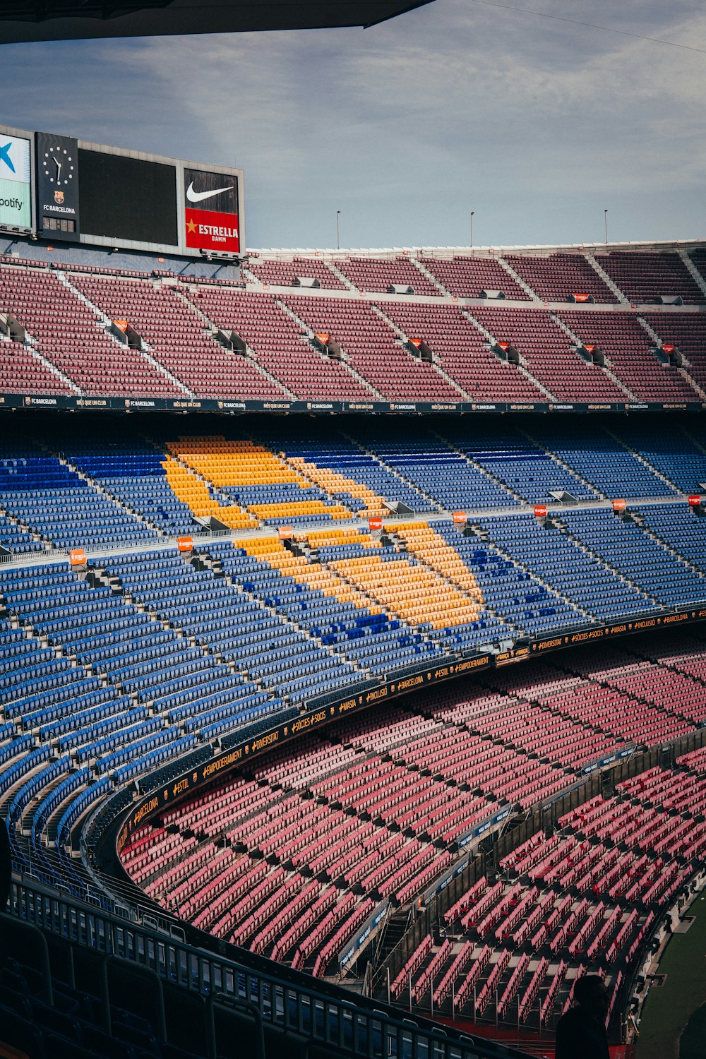 a view of a basketball court from the upper level of a stadium