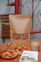 An inviting scene of people enjoying coffee and snacks from kraft bags.