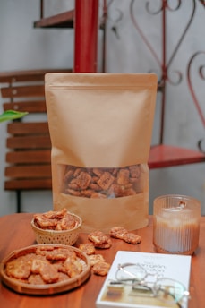 An inviting scene of people enjoying coffee and snacks from kraft bags.