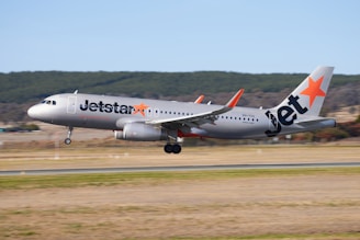 a jetliner taking off from an airport runway