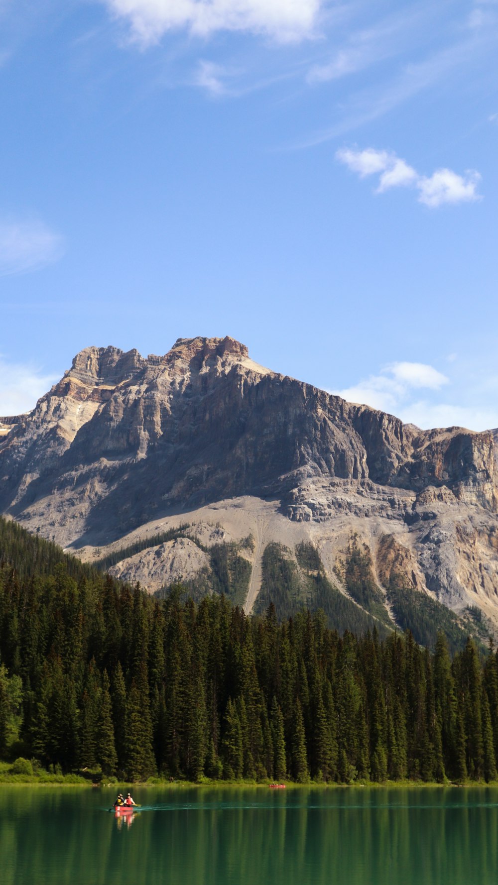 a lake with a mountain in the background