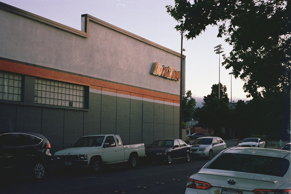 a parking lot filled with lots of parked cars