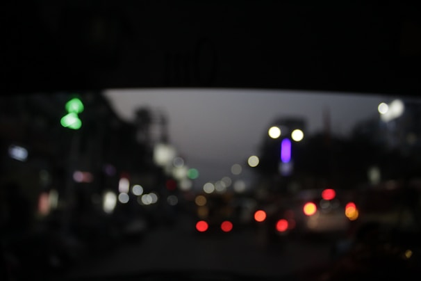 Blurred city lights at night, creating a peaceful, ambient atmosphere.