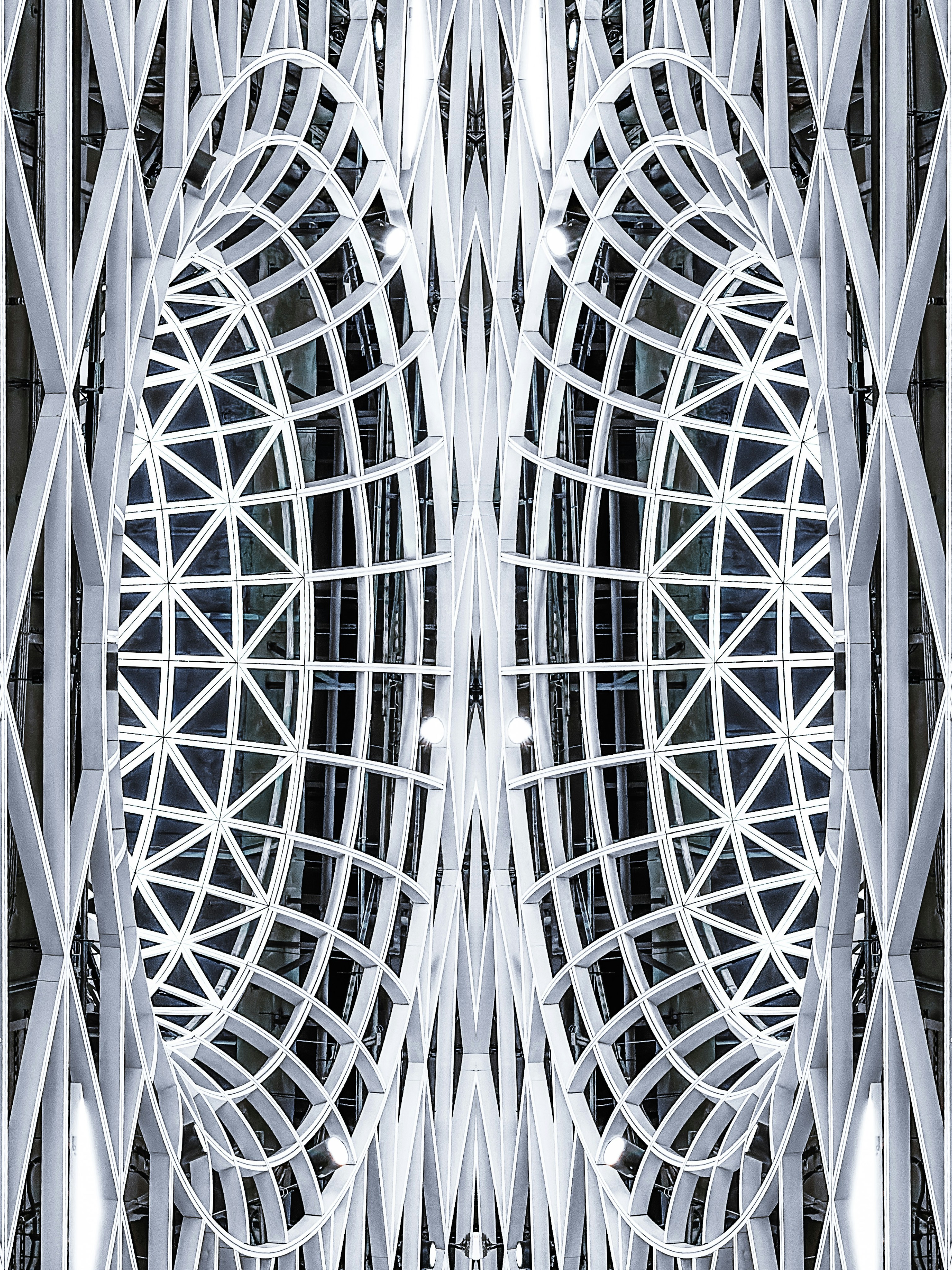 An abstract photo of a building with a circular design photo – Free ...