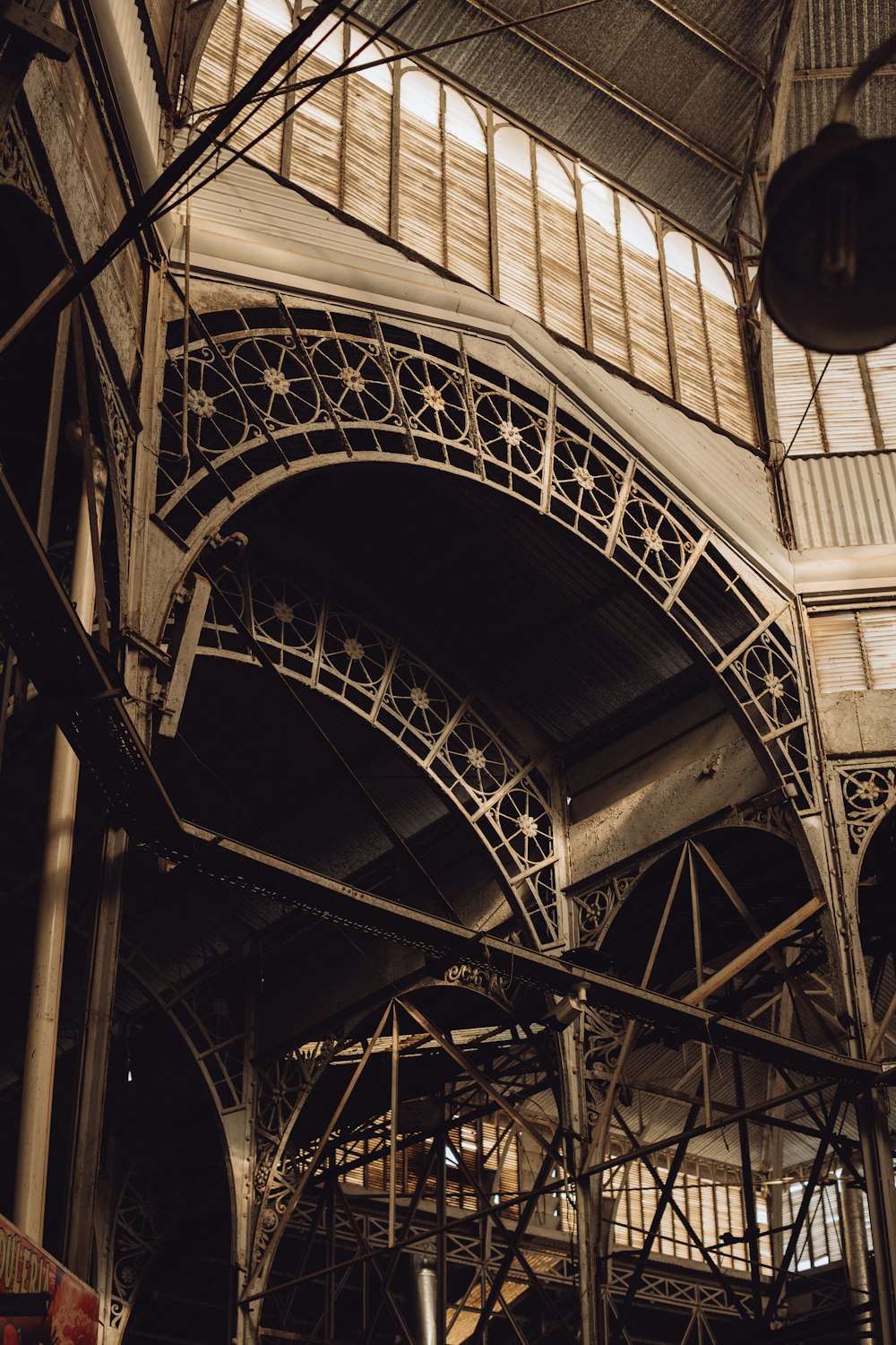 the inside of a building with a clock on the wall