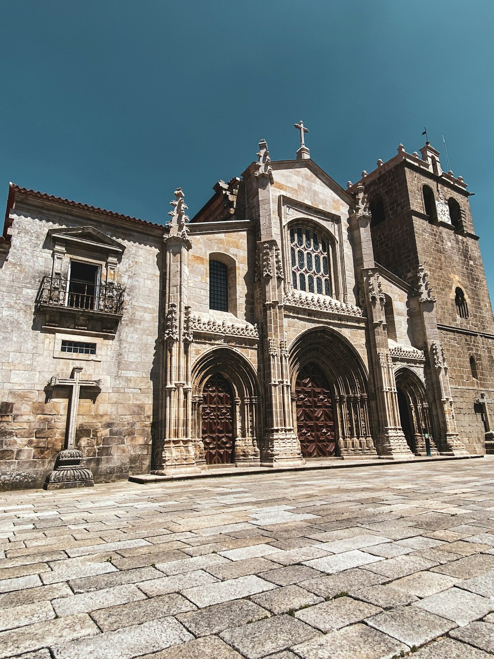 a large stone building with a clock tower