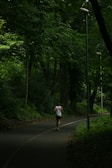 A scenic outdoor running path surrounded by greenery.