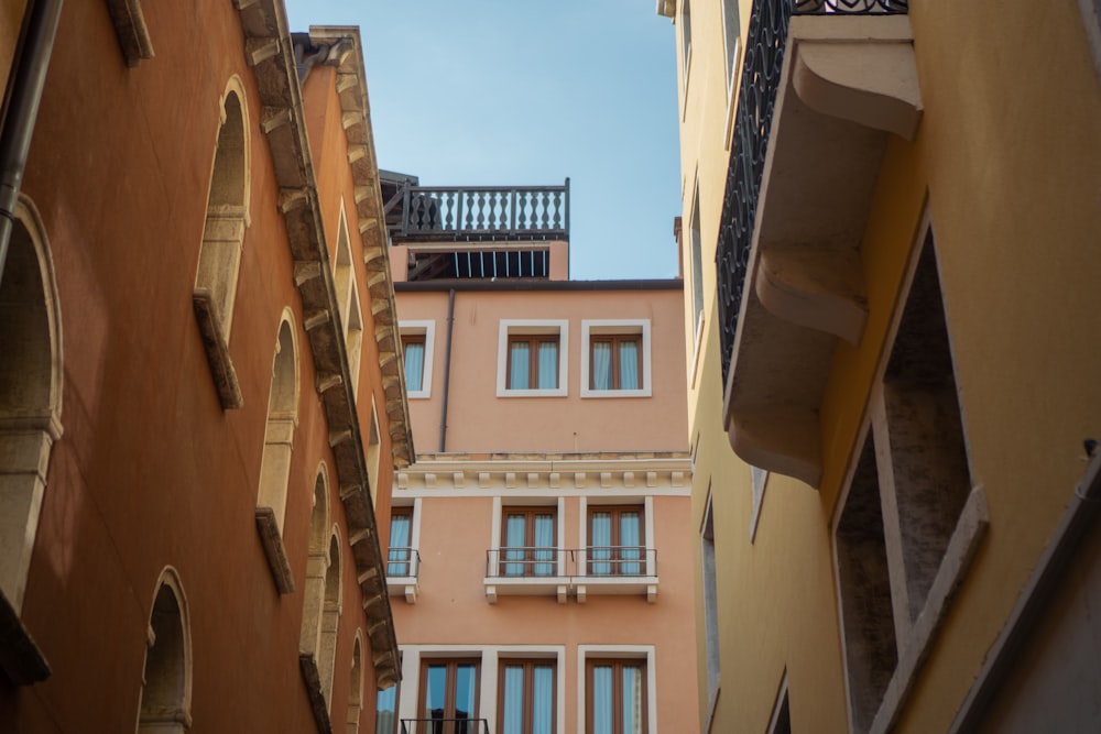 a view of a building from a narrow alley way