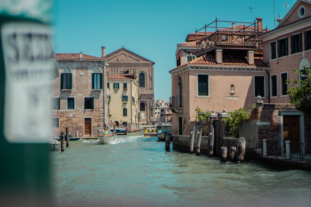 a view of a canal with buildings on both sides