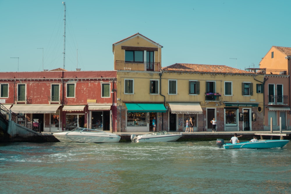 a couple of boats that are sitting in the water