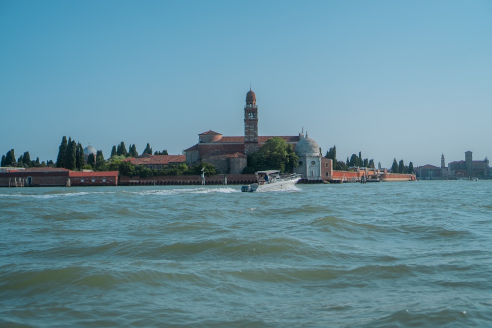 a boat traveling down a body of water