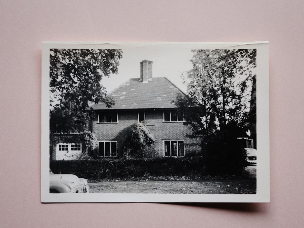 a black and white photo of a house