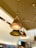 A customer happily showcasing Chelans pendant lights in her home.