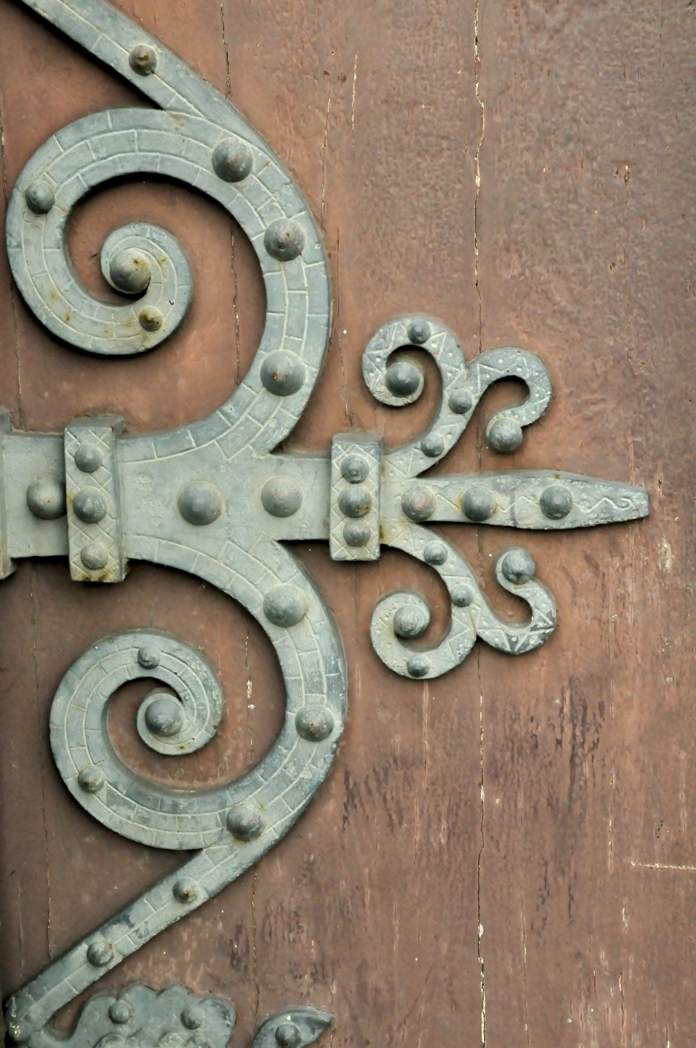 a close up of a metal object on a door