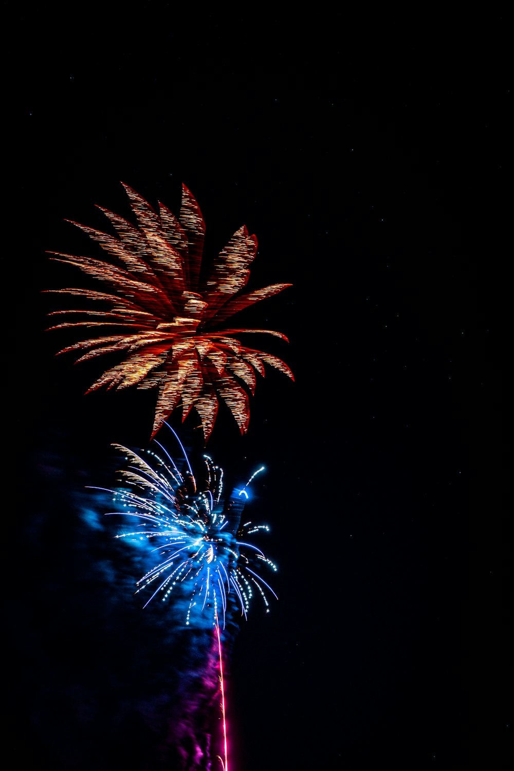 a colorful fireworks display in the night sky