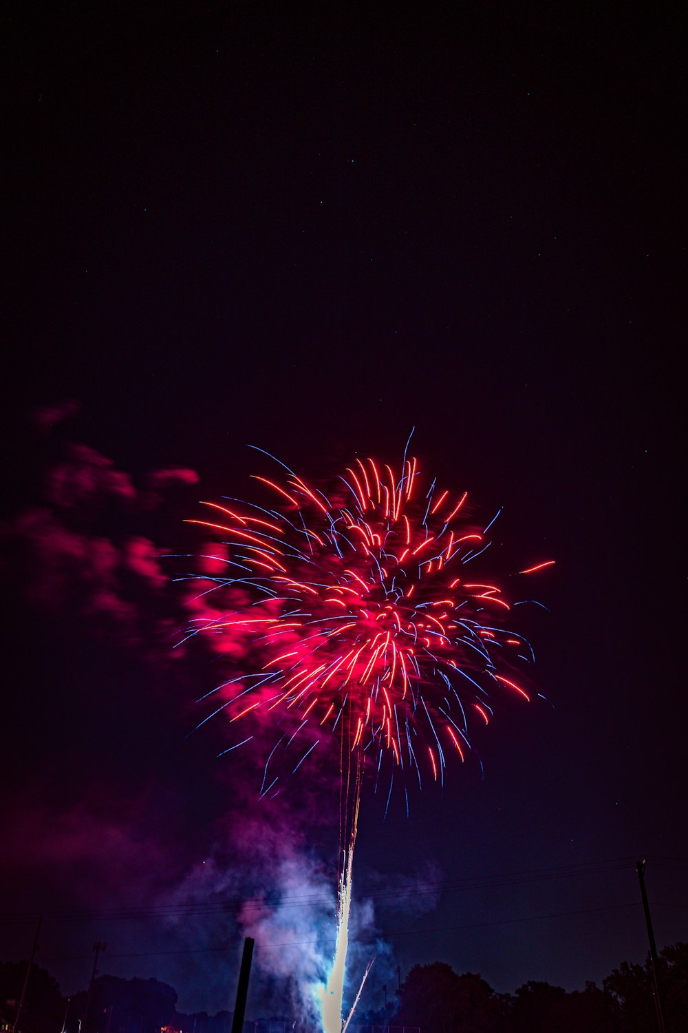 a colorful fireworks display in the night sky